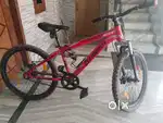 Firefox MTB bicycle red in colour with a free lock