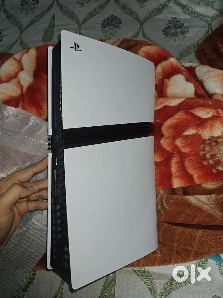 PlayStation 5 Pro – Brand New (US Unit) + Extra Camo Grey Controller