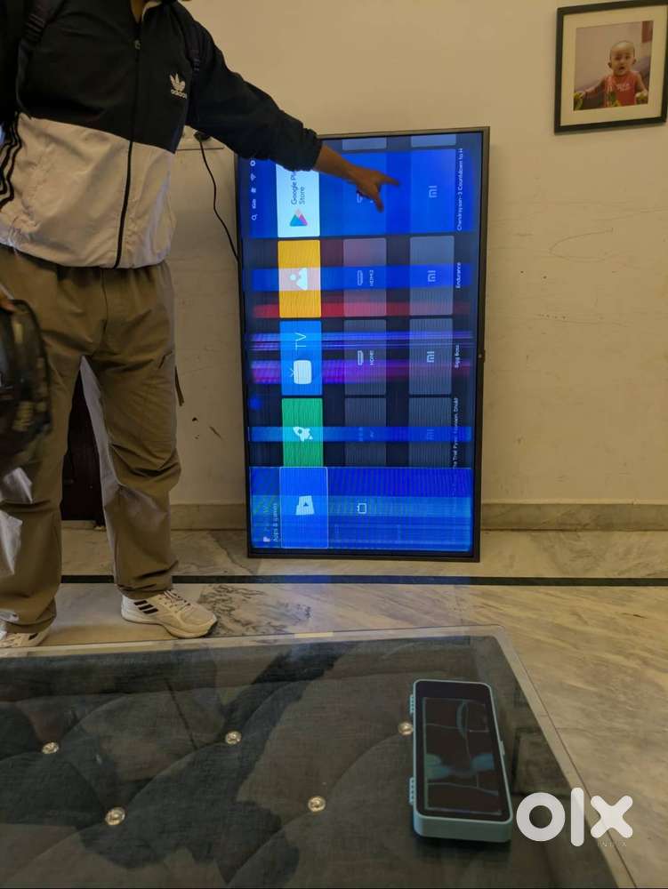MI 55 inch android TV with lines on screen