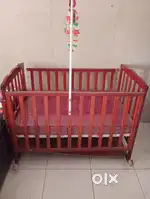 FOR SALE: Babyhug Wooden Baby Cot – Gently Used & In Great Condition!