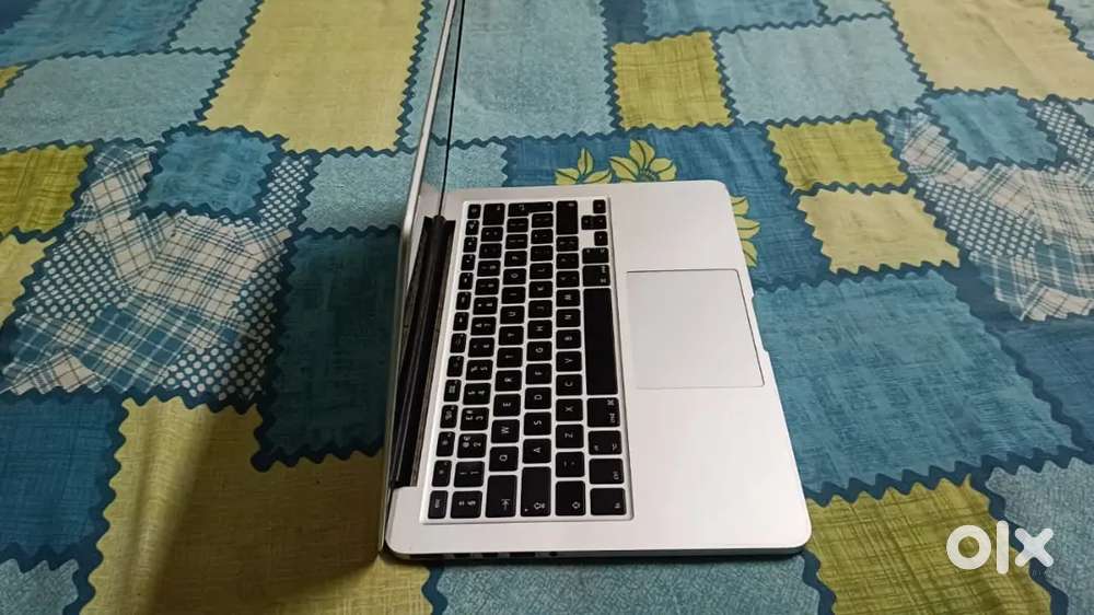 Macbook 13pro - 27000rs
