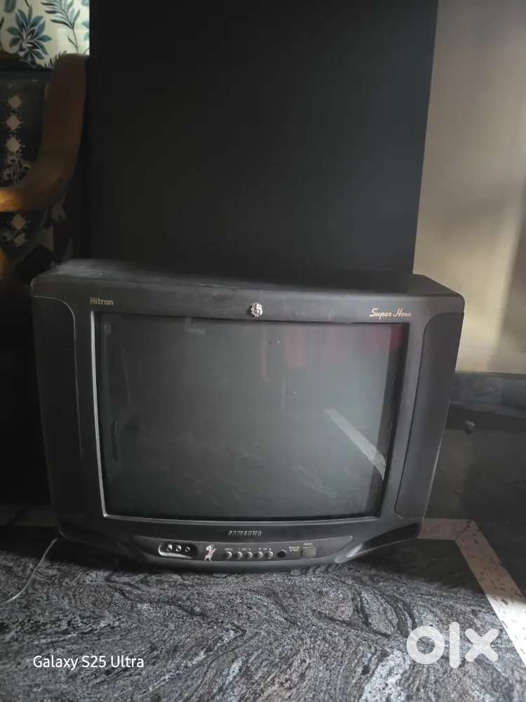 Selling old Tv and stand