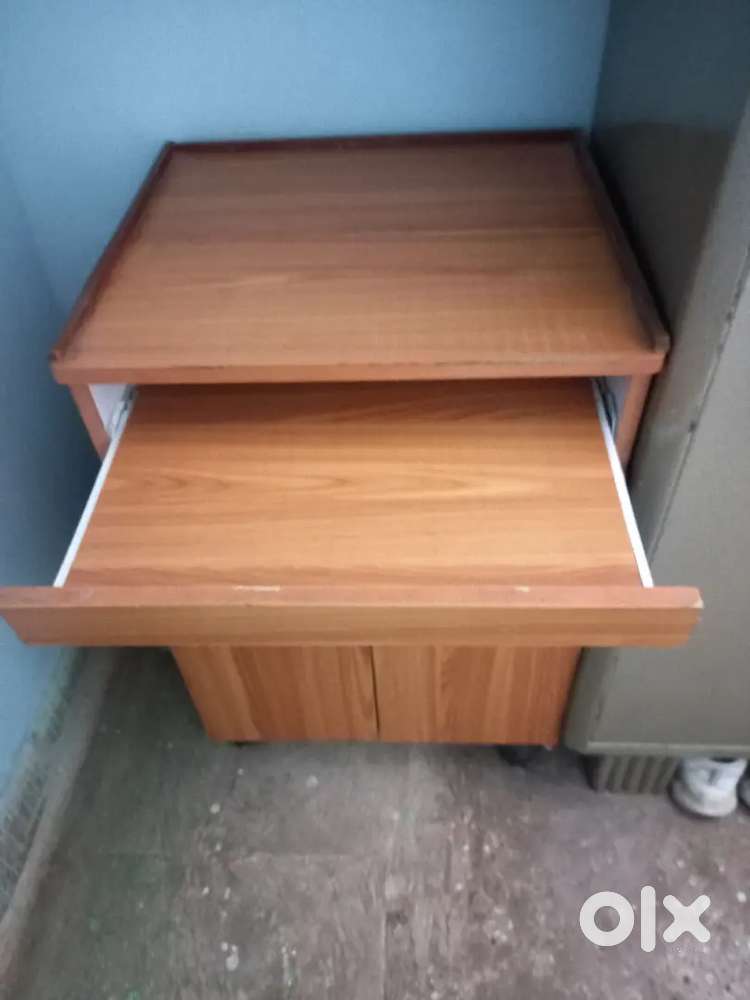 Computer table and a teak wood low height dining table