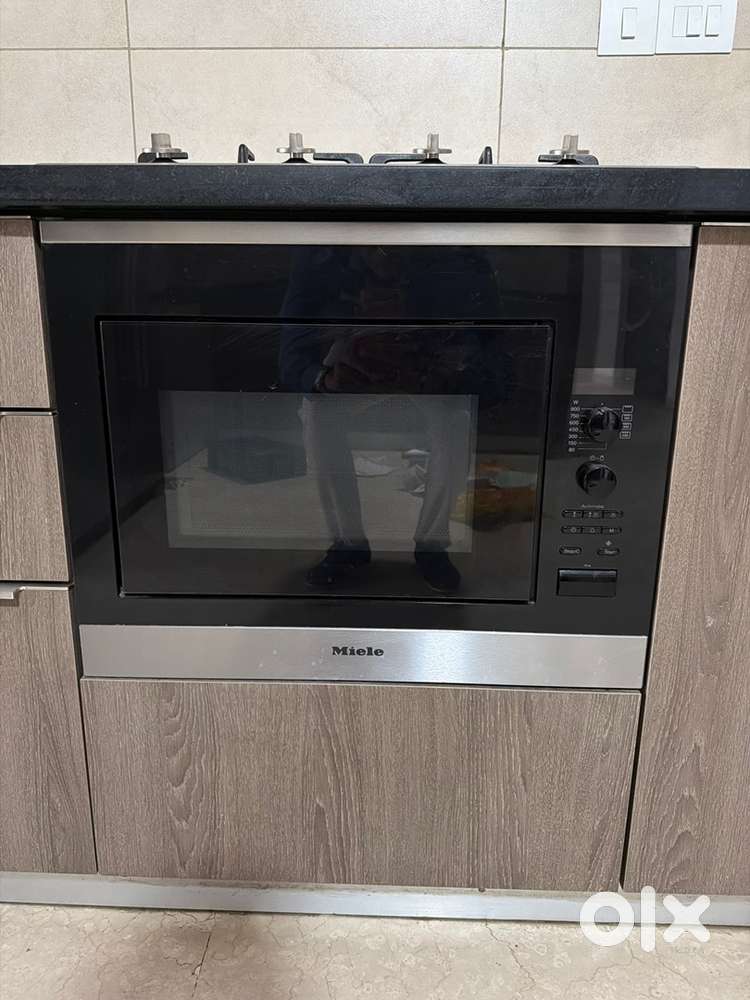 Miele microwave, hob with chimney and dishwasher