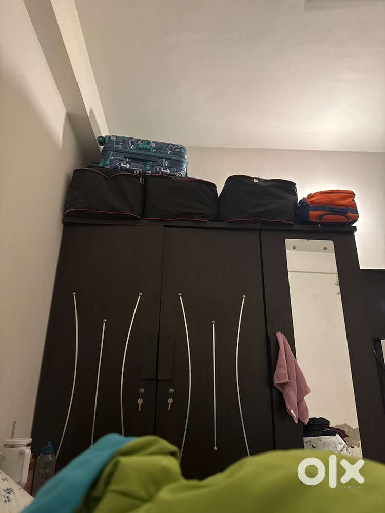 Multifunctional wardrobe & bed