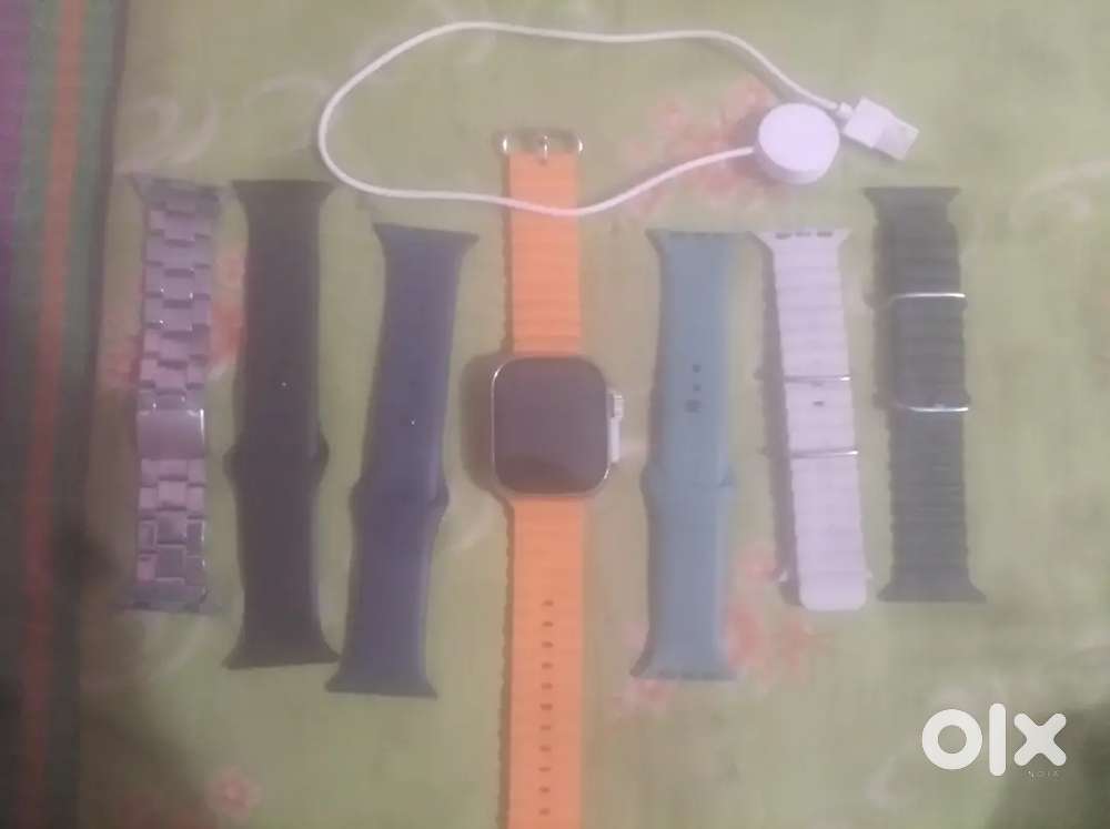 7 strap ultra smart watch with charger': Aluminum & ceramlc case; spo-