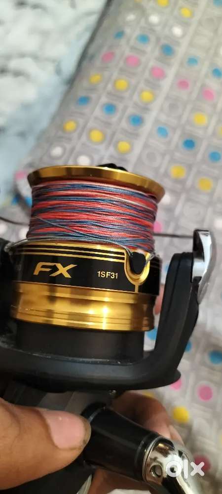 Shimano FX 4000 fishingreel oneweek not used 8 feet compass rod carbon