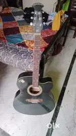 Signature acoustic guitar