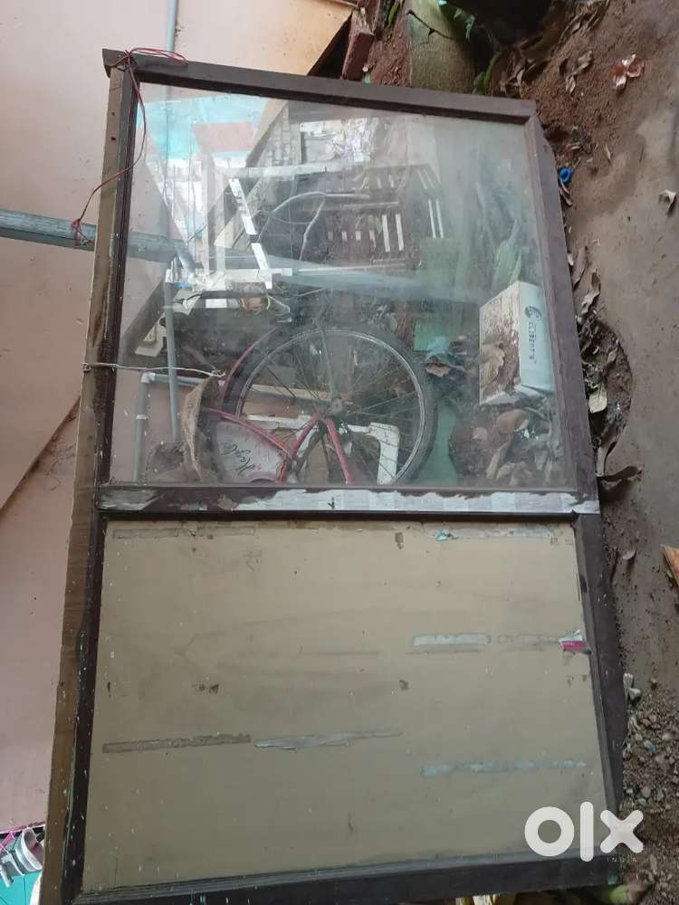 Main wood door with glass