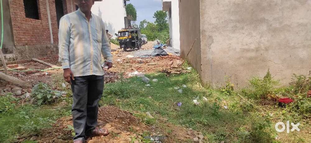 Plot in colony both side road