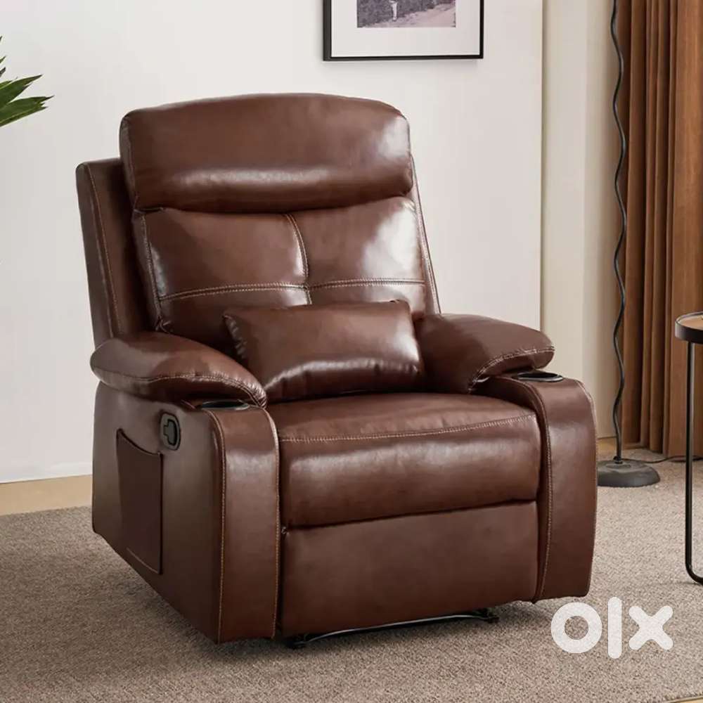 Brown leather single manual recliner sofa chair in emi available