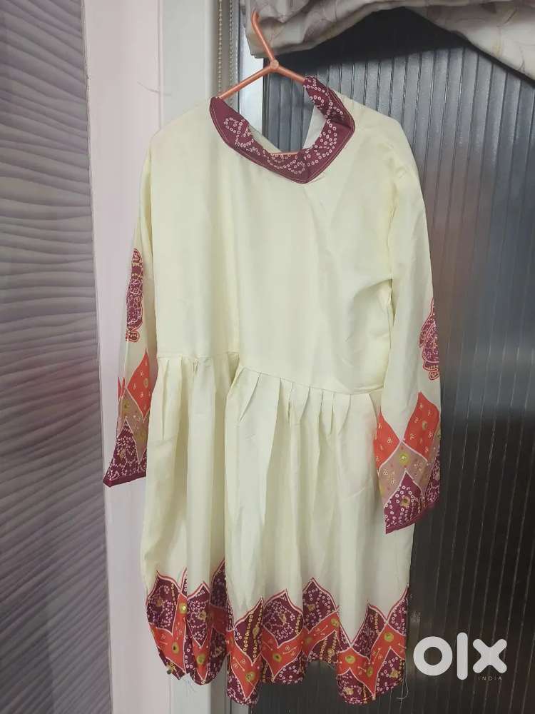 A traditional kurti and ghaghra choli along with a dupatta
