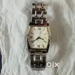 Titan 1157SEA Hexagon wrist watch with date.