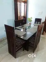 Dining table  and 6 chairs (negotiable)