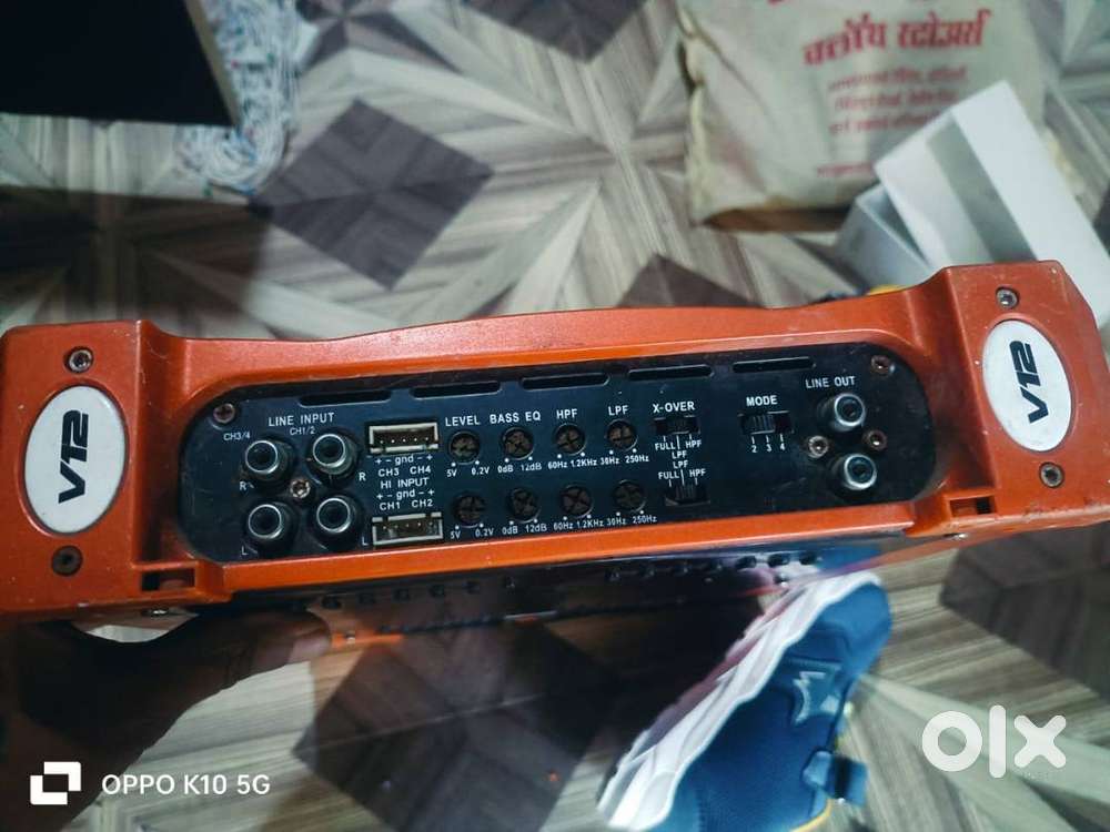 The product in the image is a V12 PN-8306 4-channel power amplifier.