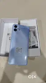 Unused phone with charger and box