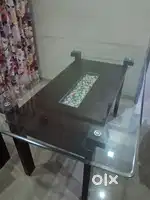 Glass top dining table.