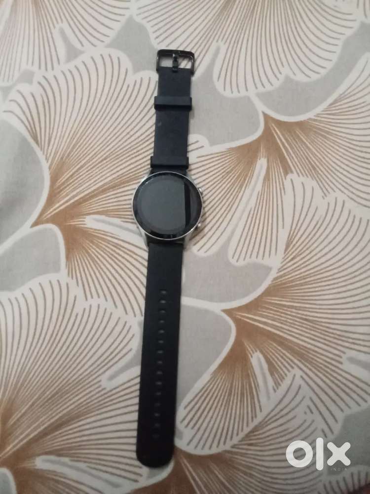 Fireboltt Watch with charging cable