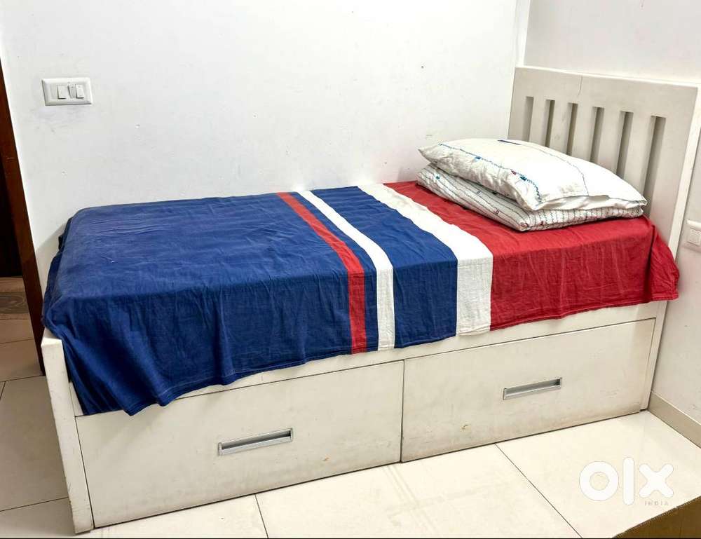 Single bed with mattress with storage(price negotiable)