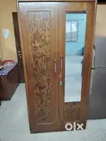 Green ply wooden Almirahwith mirror.