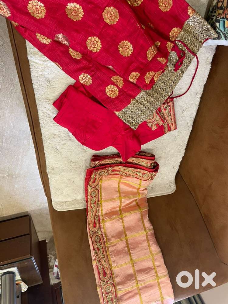 Red lehenga with heavy golden border
