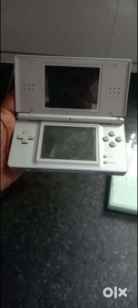 Nintendo DS lite (Both ) with original DSL Covers