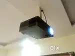 Projector with screen