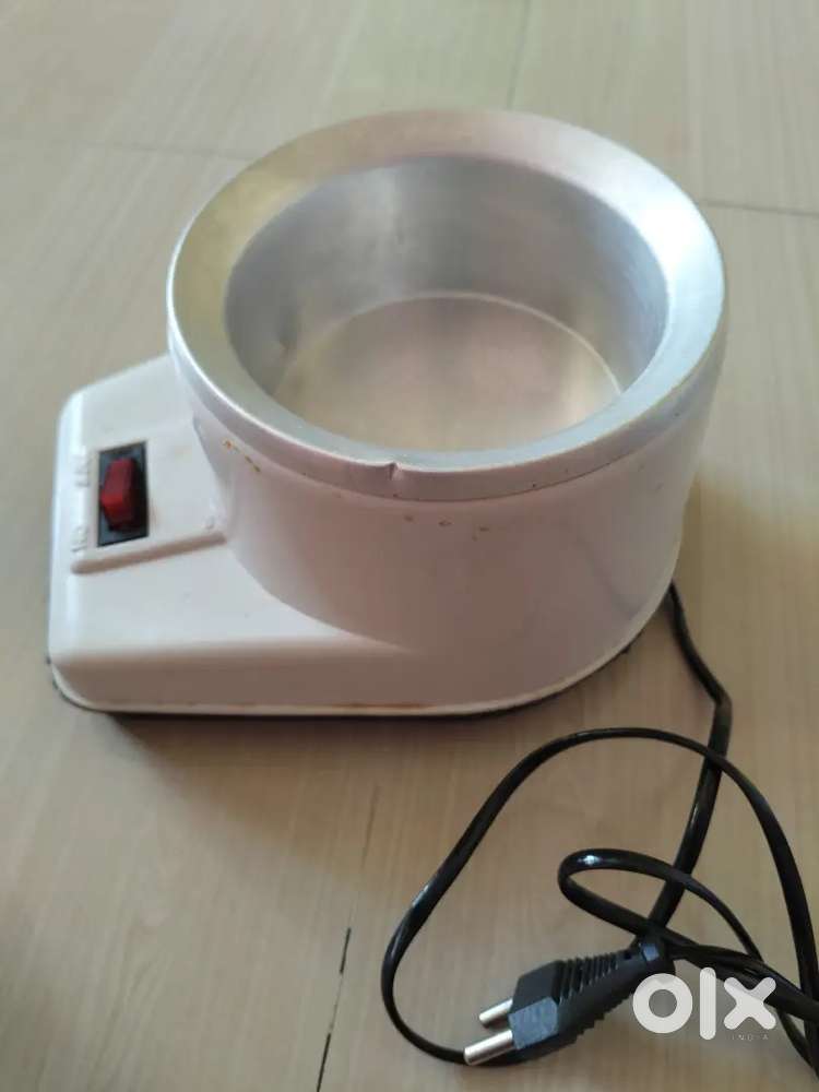Waxing heater