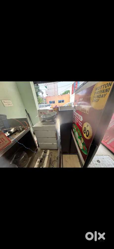 Shawarma machine and rolling shutter for shop