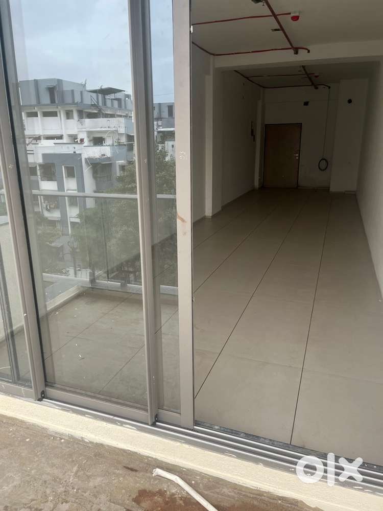 Office with balcony road facing