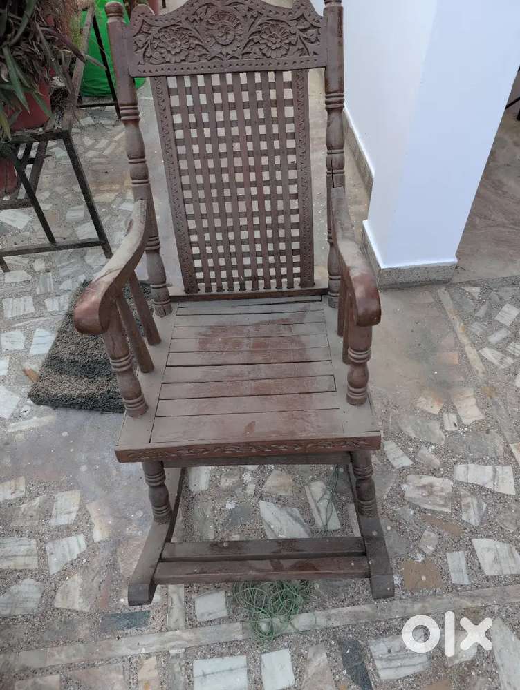 Rocking chair and three door engineered wood almirah