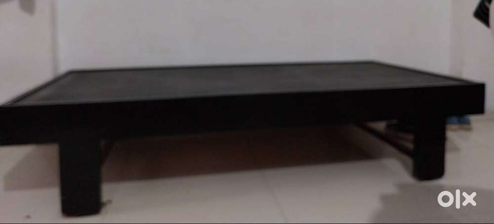 Wooden single bed