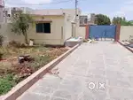 “Secure gated colony plot on National Highway – ideal for investment.”