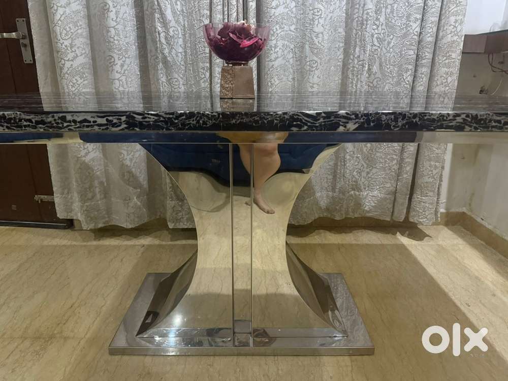 Dining table with black marble top