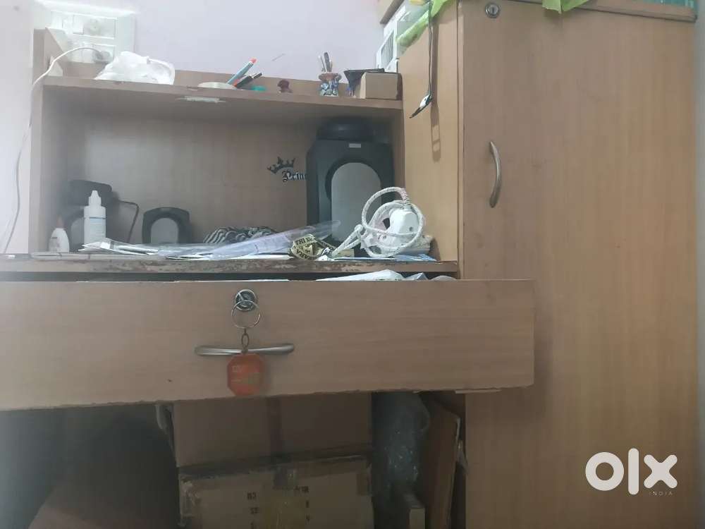 Computer table available with storage locker