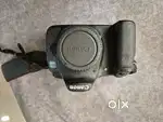 Canon DSLR EOS 60D with EFS 18-200 mm 045/1.5ft lens
