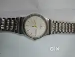 Titan watch sales day and date watch good running