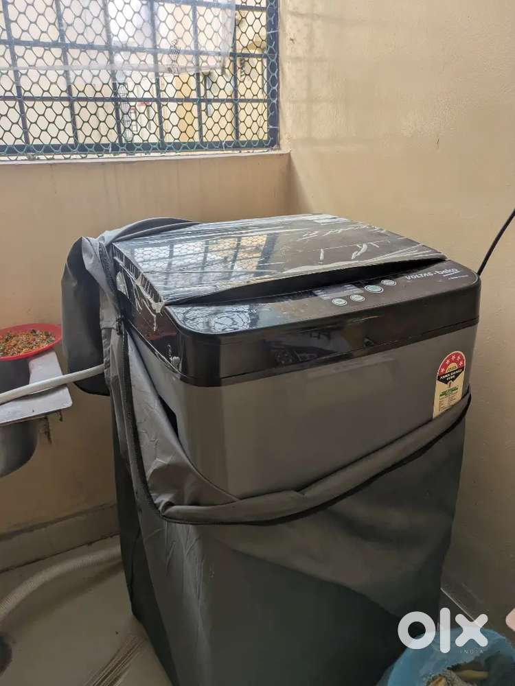 1 year old voltas washing machine