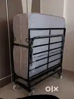 Folding single bed