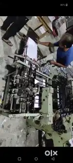 Paper folding machine