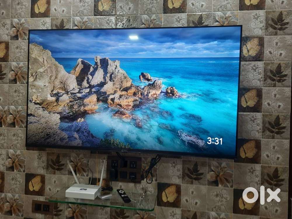 QLED Smart TV 55 with 2 years extended warranty in good condition