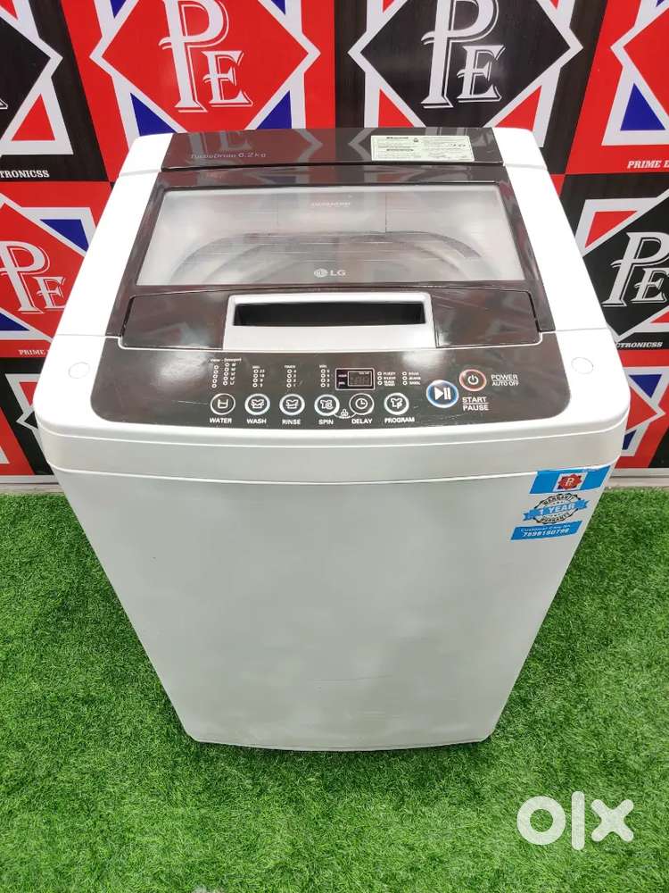 £~ Brand new looking LG washing machine with all the accessories and &