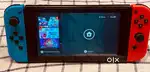 Nintendo Switch V2 with Joy-Cons & Holders – Excellent Condition