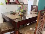 4 seat wodden and glass dinning table
