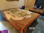 5.5 feets x 6.5 feets wooden 2 month old new bed