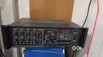 Amplifier and speaker set