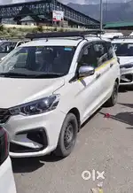 Maruti ertiga tour m white color