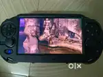BRAND NEW CONDITION SONY PS VITA OLED WITH CARTRIDGES