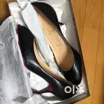 Christian Louboutin Black Patent Leather Pumps
