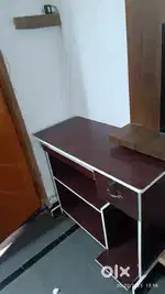 TV, Laptop Table.With shelfs 2months old
